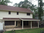 James HardiePlank Siding and patio cover we built to look like part of the home and NOT an add on. Houston Spring The Woodlands TX by Texas Home Exteriors 281.919.6999