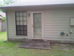 Siding and New Door Before
